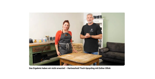 Workshop-Szene in Werkstatt für Schönes: Zwei Personen beim Tisch-Upcycling mit Hartwachsöl, Werkzeugbank im Hintergrund.